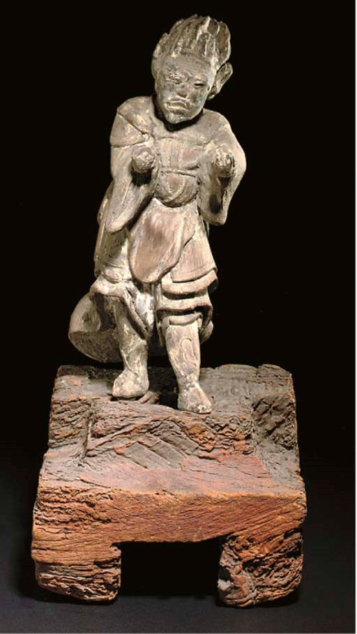 A Japanese wood figure of a demon, 16th/17th century