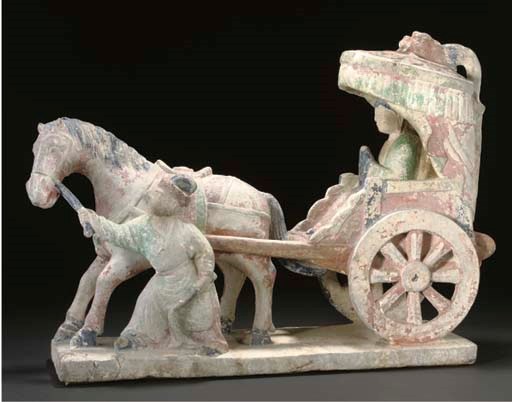 A Chinese Ming style stone carving of a horse and carriage
