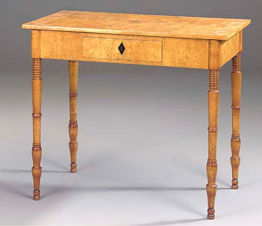 A GERMAN BIEDERMEIER BURR BIRCH, BIRCH AND EBONY SIDE TABLE