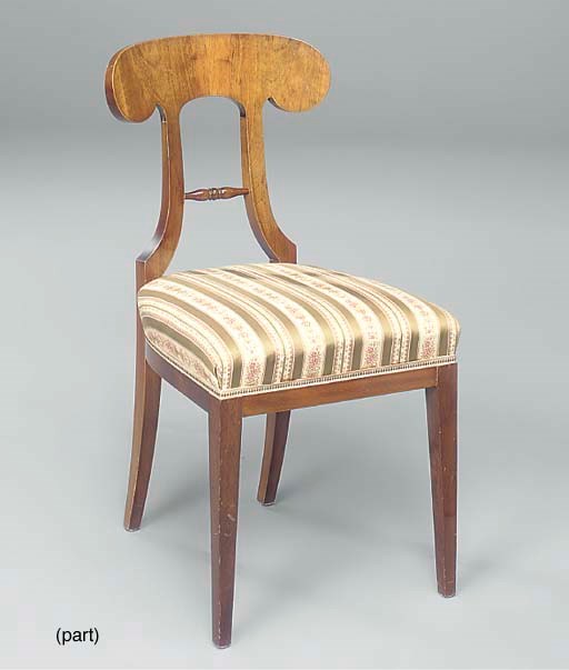 A MATCHED SET OF TWELVE BEECH DINING CHAIRS