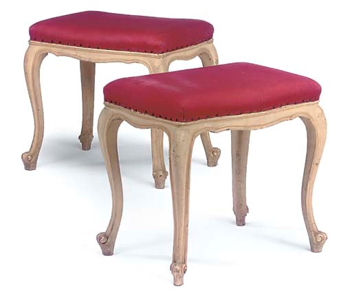 A PAIR OF FRENCH CREAM PAINTED STOOLS