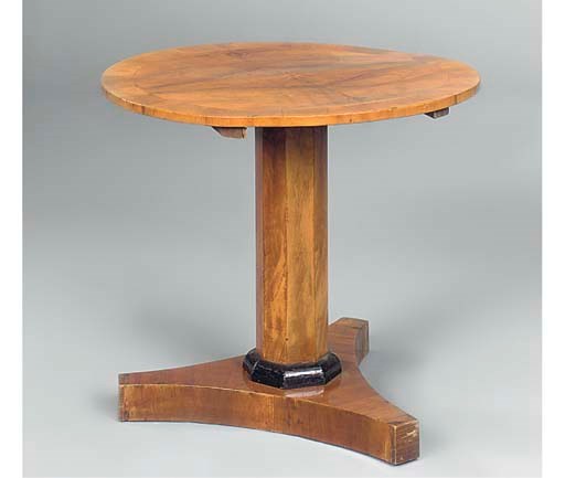AN AUSTRIAN WALNUT AND INLAID CIRCULAR CENTRE TABLE