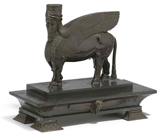 A FRENCH BRONZE MODEL OF AN ASSYRIAN SPHINX