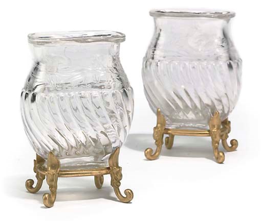 A PAIR OF FRENCH MOULDED GLASS VASES MOUNTED ON GILT-BRONZE STANDS