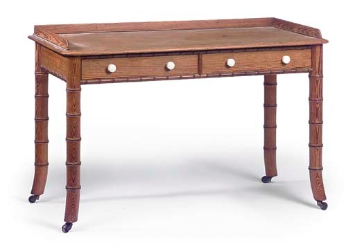 A VICTORIAN PINE WRITING TABLE