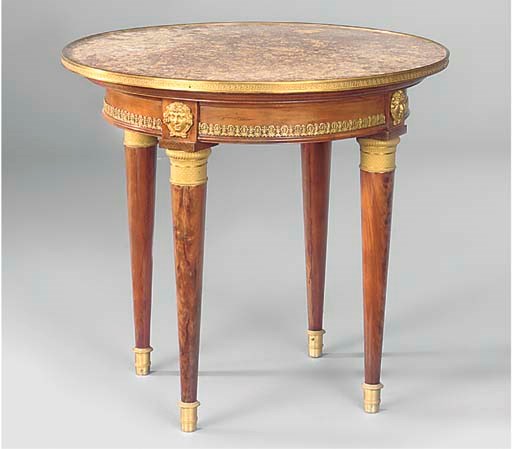A FRENCH GILT-METAL MOUNTED MAHOGANY GUERIDON