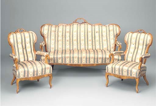 AN AUSTRIAN WALNUT THREE-PIECE SUITE