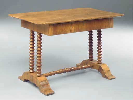 AN AUSTRIAN WALNUT WRITING TABLE