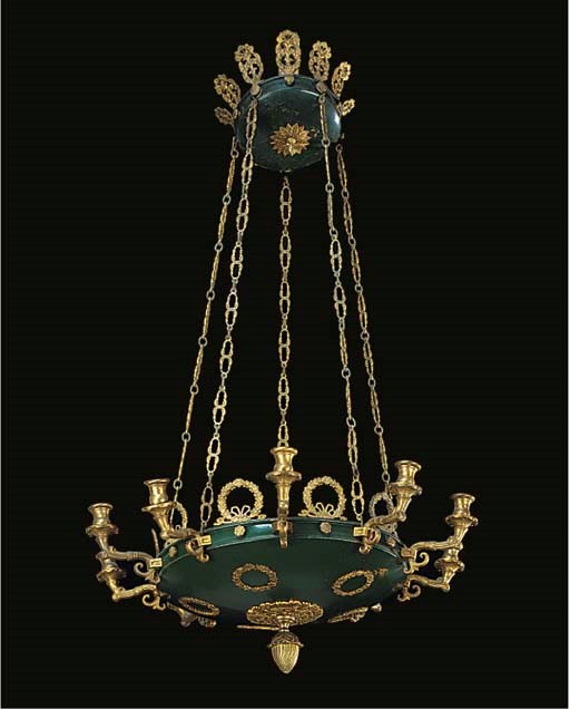 A GILT AND GREEN PATINATED BRASS CHANDELIER