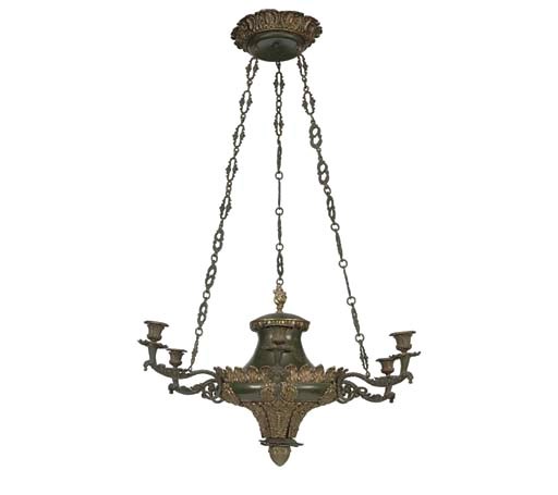 A LOUISE PHILIPPE GILT AND GREEN PATINATED BRASS SIX-LIGHT CHANDELIER