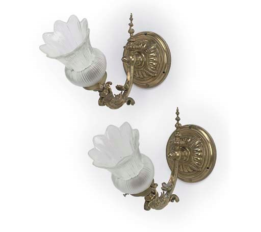 A PAIR OF VICTORIAN GILT BRASS WALL LIGHTS