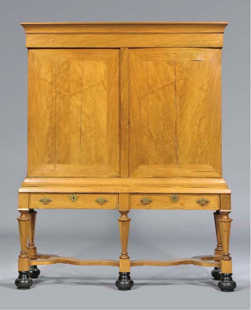 A DUTCH TEAK CABINET ON STAND
