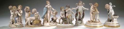 Seven various Meissen porcelain putto groups
