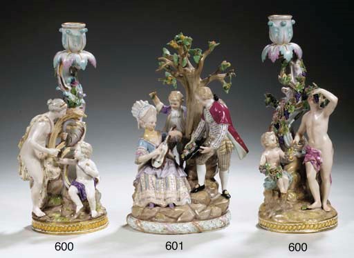 A pair of Meissen porcelain allegorical figural candlestickholders from the Four Seasons series
