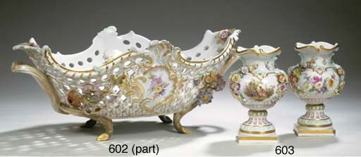 A pair of small Meissen porcelain flower-encrusted gallant urn vases