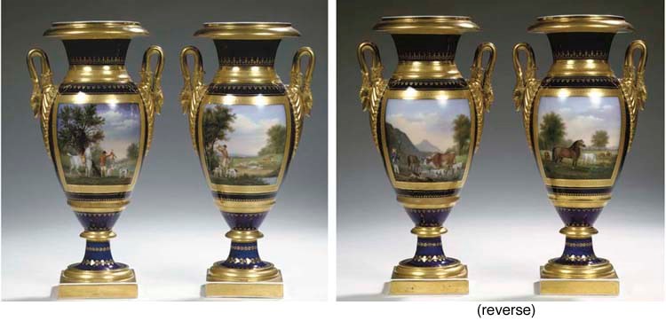 A pair of Paris porcelain heavily gilt two-handled hunting vases