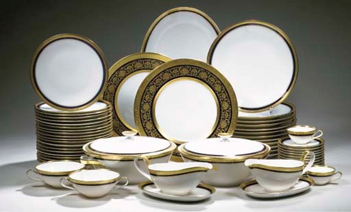 An extensive Hutschenreuter porcelain gilt dinner service