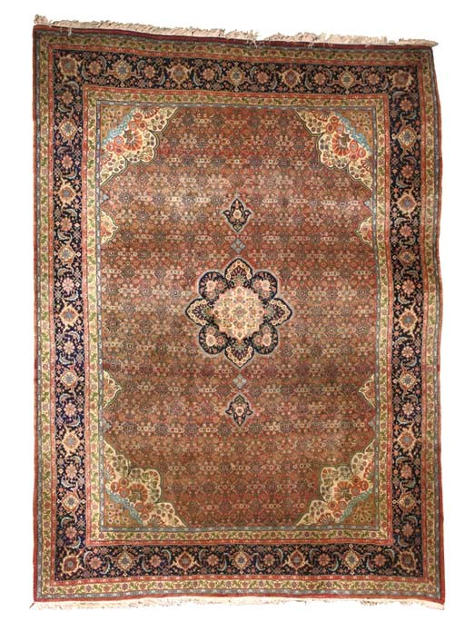 AN INDO-TABRIZ CARPET