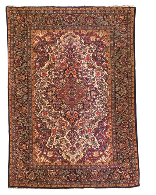 A KIRMAN RUG