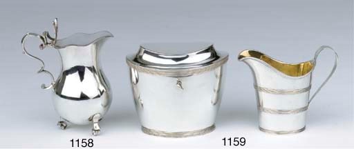 A Dutch silver teacaddy and a Swedish silver milk jug