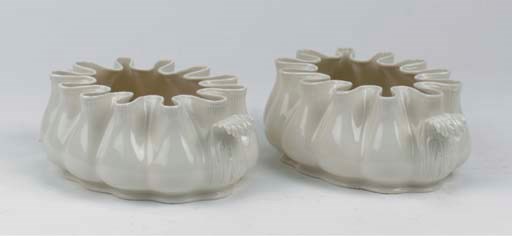 A pair of Nymphenburg white porcelain oval two-handled monteiths or glass coolers