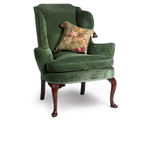 A GEORGE I WALNUT WING ARMCHAIR