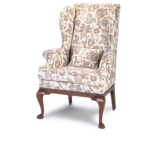 A GEORGE I WALNUT WING ARMCHAIR