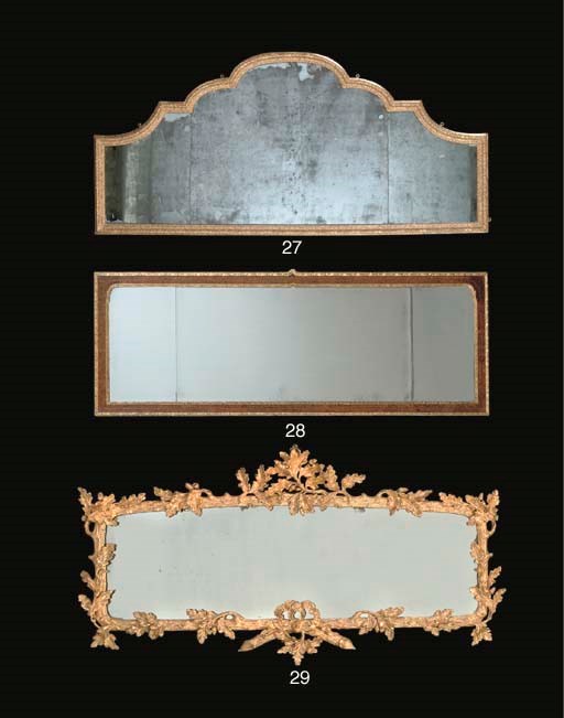 A BURR-WALNUT AND PARCEL-GILT OVERMANTEL MIRROR