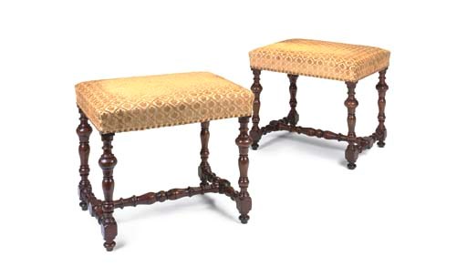 A PAIR OF CONTINENTAL WALNUT STOOLS