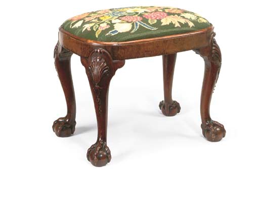 A GEORGE II WALNUT OVAL STOOL