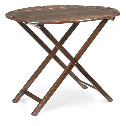 A GEORGE III MAHOGANY OVAL BUTLER'S TRAY ON LATER STAND