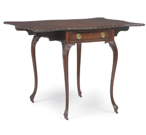 A GEORGE III MAHOGANY SERPENTINE PEMBROKE TABLE