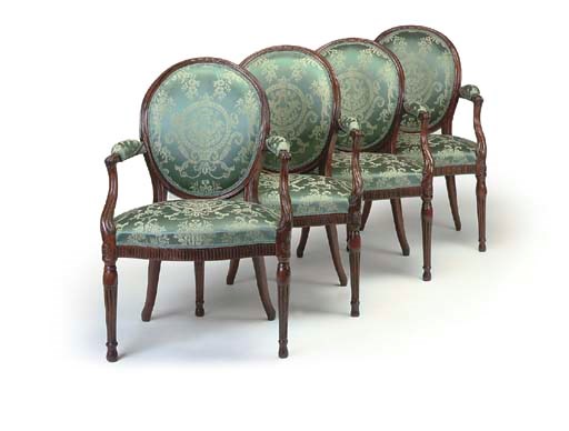 A SET OF FOUR GEORGE III MAHOGANY OPEN ARMCHAIRS