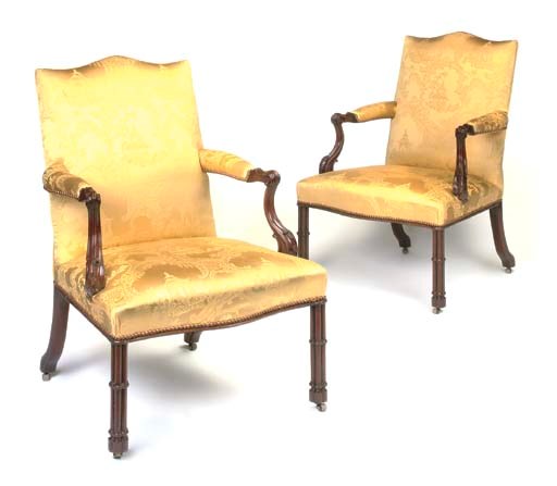 A PAIR OF MAHOGANY OPEN ARMCHAIRS