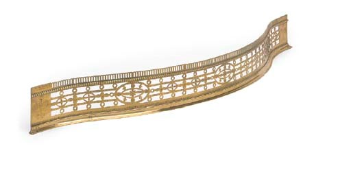 A GEORGE III BRASS FENDER