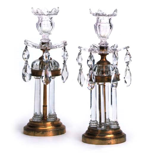 A PAIR OF CUT-GLASS AND GILT-METAL CANDLESTICKS