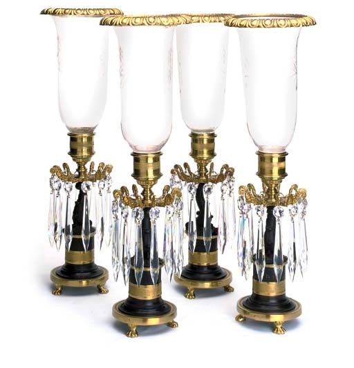A SET OF FOUR BRONZE TABLE-LAMPS