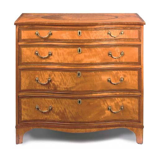 A GEORGE III SATINWOOD SERPENTINE CHEST