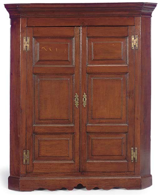 AN ENGLISH OAK HANGING CUPBOARD