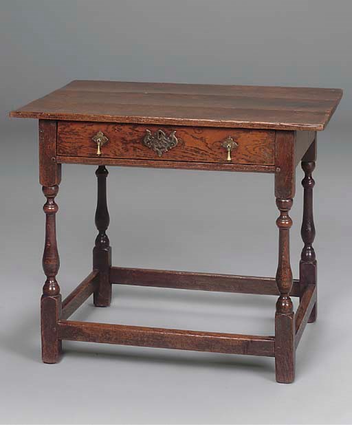 AN ENGLISH OAK SINGLE DRAWER SIDE TABLE