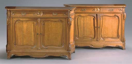 A pair of Flemish oak sideboards