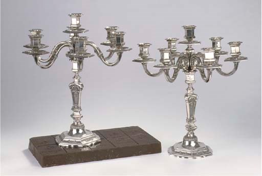 A pair of Italian silver seven-light candelabra