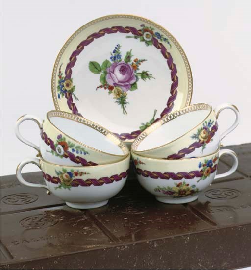 A set of four Meissen Marcolini porcelain floral cups and saucers