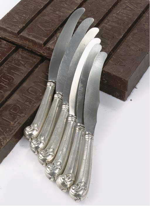 Six Dutch silver pistol-handled table knives