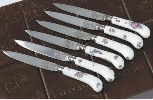 A set of six Meissen porcelain pistol-shaped knife handles
