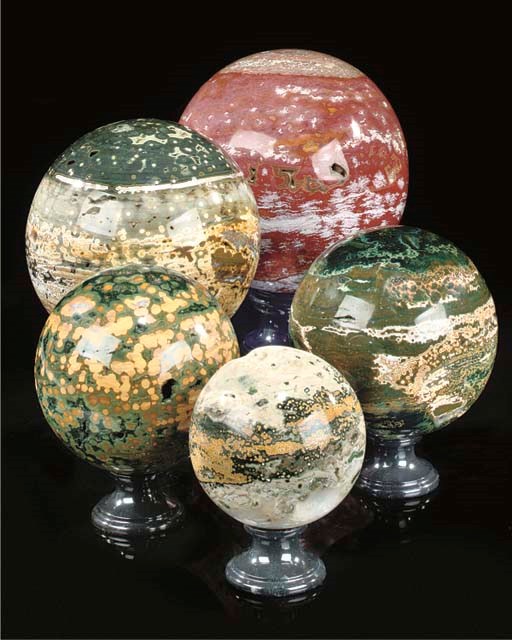 A fine group of five ocean jasper spheres,