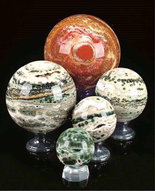 A fine group of five ocean jasper spheres,