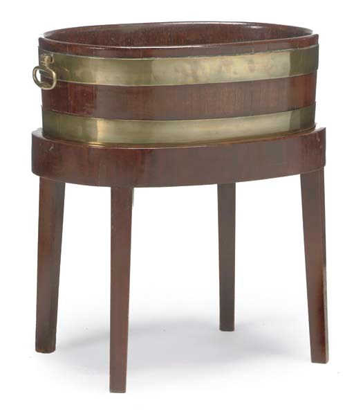 A GEORGE III MAHOGANY AND BRASS BOUND OVAL WINE COOLER