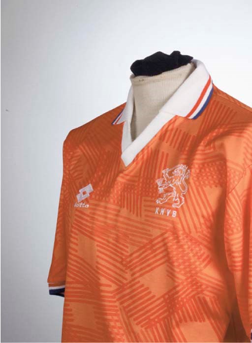AN ORANGE HOLLAND INTERNATIONAL SHORT-SLEEVED SHIRT