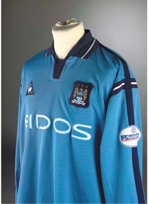 A SKY-BLUE MANCHESTER CITY SHIRT